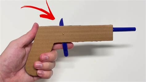 How to make a cardboard gun that shoots - YouTube