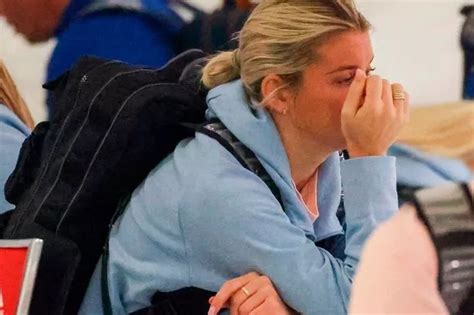 Alessia Russo appears to break down in tears at airport as England Lionesses fly home - Daily Star