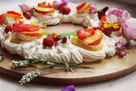 Simple meringue wreath with lemon curd and edible flowers | Amy Treasure