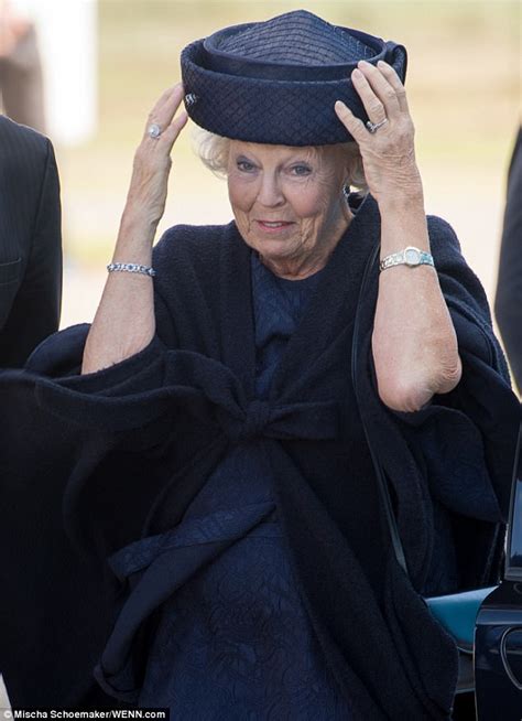 Princess Beatrix struggles to keep her hat on in Borssele | Daily Mail ...