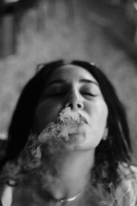 Portrait of a Woman Smoking a Cigarette in Black and White · Free Stock ...