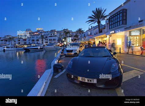 Luxury cars, Restaurants near harbour, Puerto Banus, Marbella Stock Photo: 29090613 - Alamy