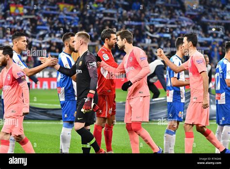 Players of RCD Espanyol and Players of FC Barcelona in action during ...