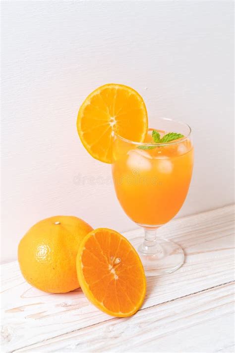 Orange juice with ice stock image. Image of healthy - 153425221