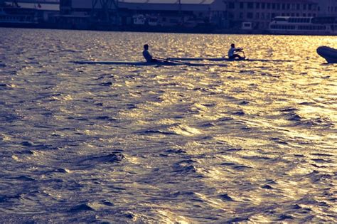 Premium Photo | Racing rowing boat or scull boats on a calm sea