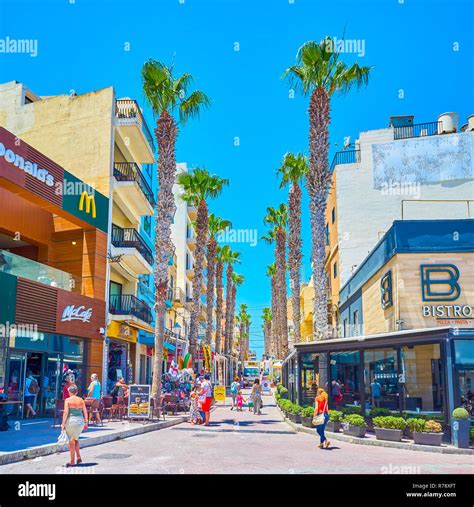 BUGIBBA, MALTA - JUNE 14, 2018: The Pjazza Walkway is the narrow street with the greatest ...