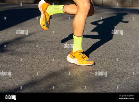 Running Shoes with Shadow Stock Photo - Alamy