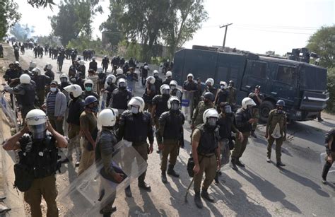 Four Pakistani police killed in violence at far-right TLP protest ...