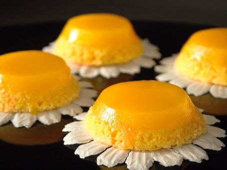 Quindim - Read more about its history at http://desserteater.com/quindim-brazilian-coconut ...