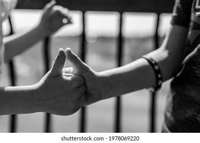 Two Children Playing Thumb War Battle Stock Photo (Edit Now) 1978069220 | Shutterstock