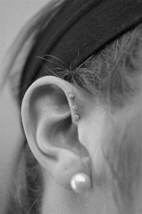 Triple Anti Helix Piercing And Lobe Piercing