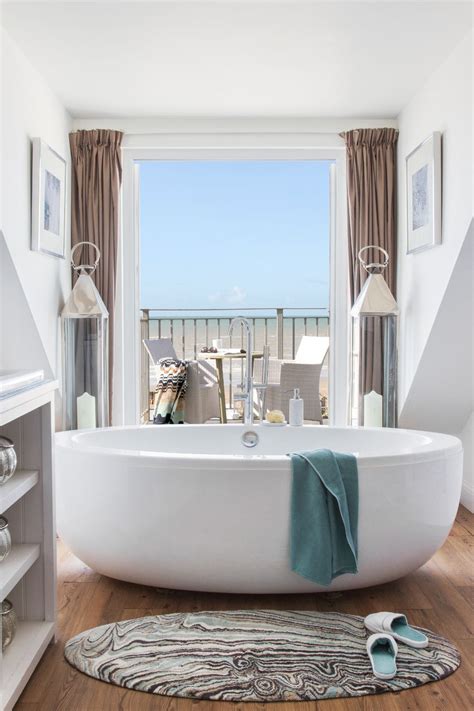 AMARA.COM, shop the look, lantern, beach view, bathroom, white bath ...