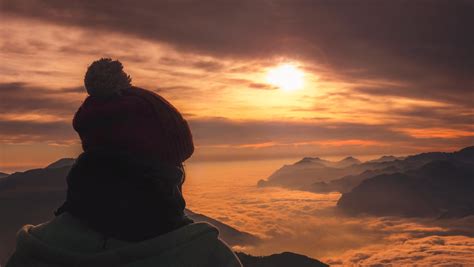 the silhouette person sitting on monte stivo viewing the sunrise or sunset, silhouette person on ...