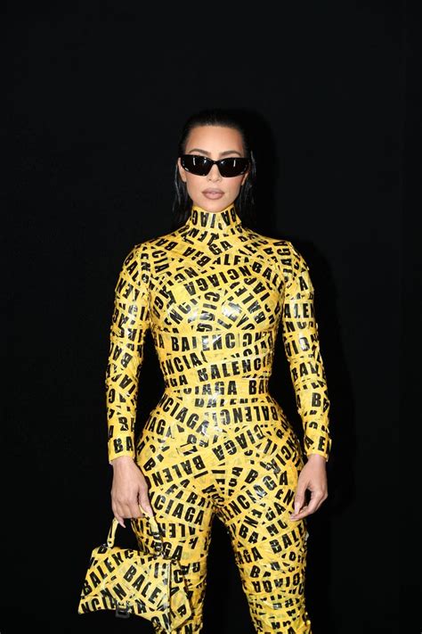 Kim Kardashian Wears a Balenciaga Caution Tape Catsuit