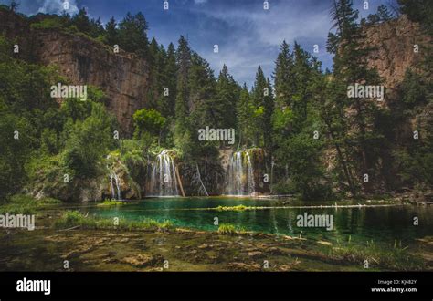 Serene Waterfalls and clear green water at Hanging Lake, Glenwood Canyon, Colorado Stock Photo ...