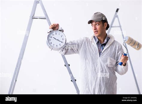 Painter working at the construction site Stock Photo - Alamy