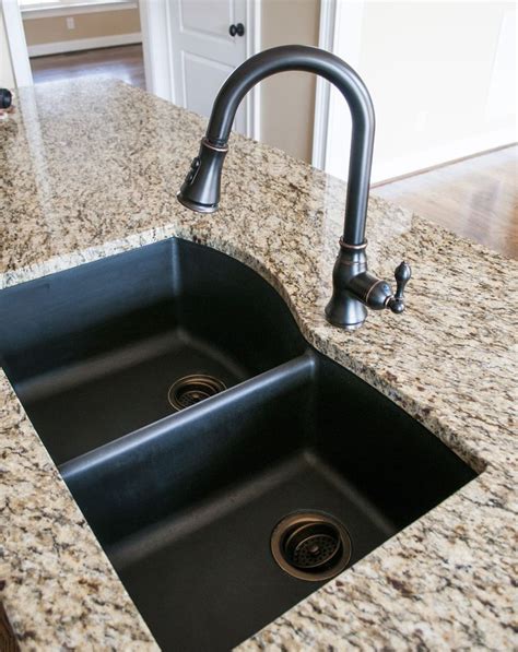 Black granite composite sink with Kohler Oil Rubbed Bronze faucet and drain...so dreamy ...