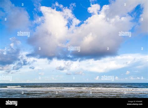 Blue sea beach Stock Photo - Alamy