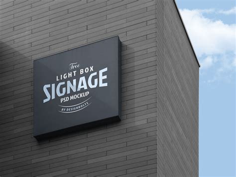 Free Wall Mounted Company Logo Signage Board on Building Mockup PSD ...