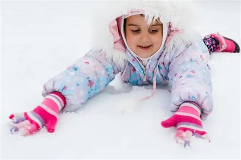 Kids Playing With Snow Stock Photos, Images and Backgrounds for Free ...