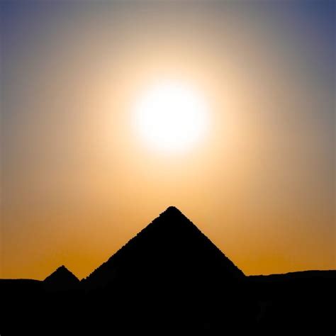 Silhouette of Pyramids during Sunset · Free Stock Photo