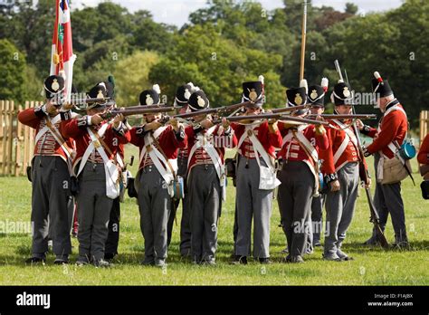 Reenactment of the 33rd Regiment foot soldiers going into battle Stock Photo - Alamy