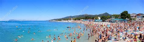 KABARDINKA, RUSSIA. July 4, 2016: People resting on beach in Kabardinka. Kabardinka is a resort ...