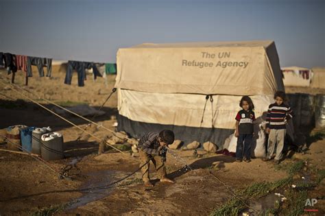 Youngest refugees bear brunt of Syrian war woes — AP Photos