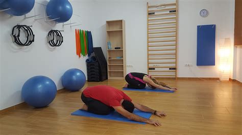 Couple Practicing Yoga, Child's Pose