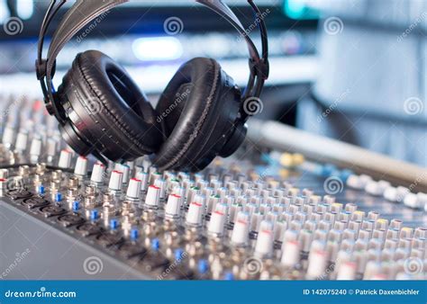 Radio Station: Headphones on a Mixer Desk in an Professional Sound ...