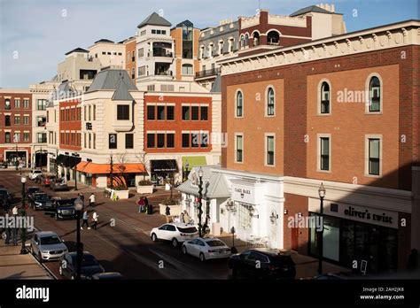 Pedestrians and shops at the Carmel City Center shopping plaza in ...