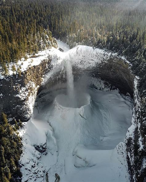 This Powerful Waterfall in Canada Ejects So Much Spray in the Air That an Enormous Ice Cone Is ...