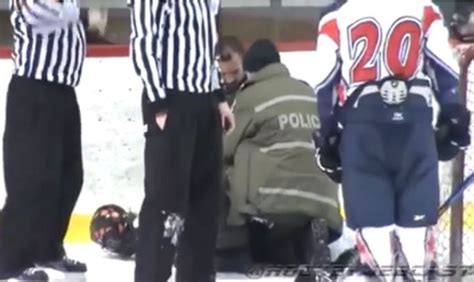 WATCH: Hockey player handcuffed on ice after altercation with ref - CBSSports.com