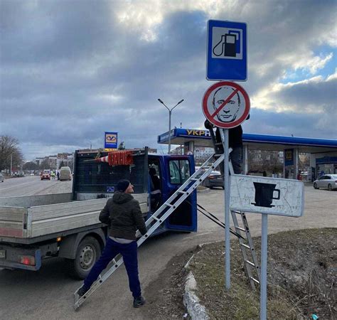 Road signs in Ukraine direct expletives at the Russian military : NPR