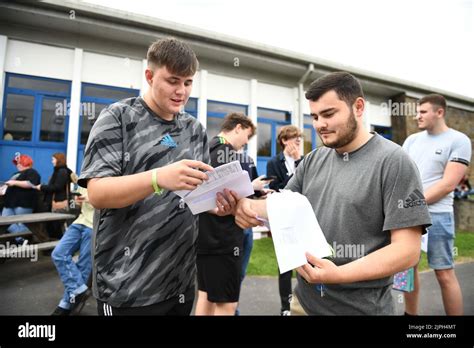 Gower College Swansea students Carwyn Bowen (left) and Samuel Lovering open their A-Level ...