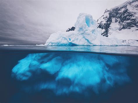 An iceberg from above and below. From the Antarctica Peninsula. [OC][2048X1536] by ...