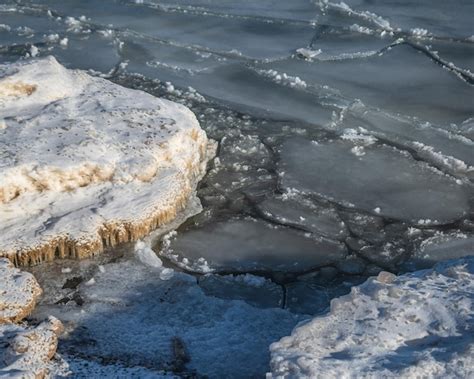 Premium Photo | Ice on the water is melting and the water is melting.