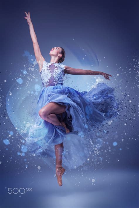 The beautiful ballerina dancing in long blue dress on blue background | Dance photography poses ...