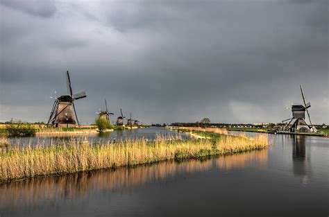 Kinderdijk Windmills After The Rain Photograph by Frans Blok - Fine Art America