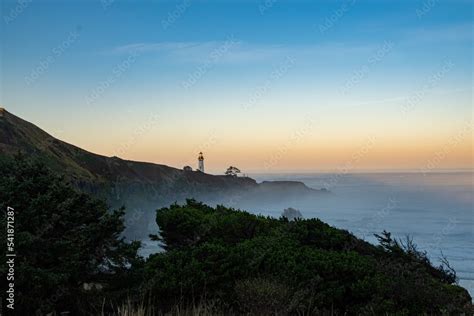 Sunrise at the Yaquina Head Lighthouse in Newport, Oregon. The ...