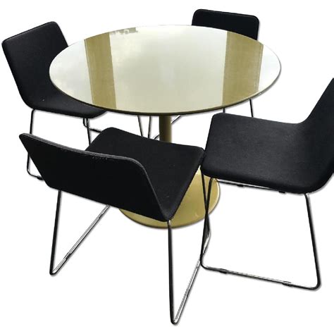 CB2 Round Dining Table w/ 4 Chairs - AptDeco