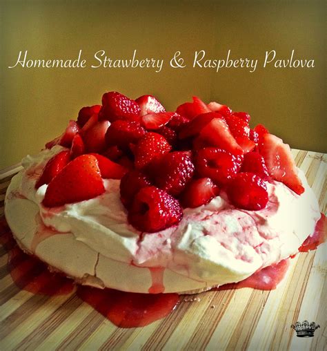 a cake with strawberries and whipped cream on top