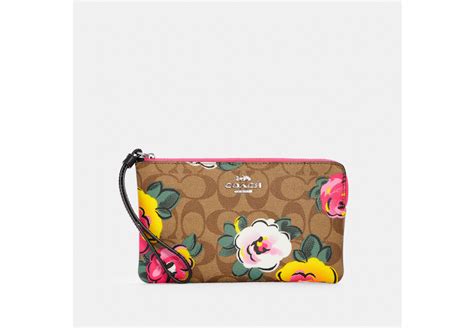 COACH® Outlet | Large Corner Zip In Signature Canvas With Vintage Rose Print