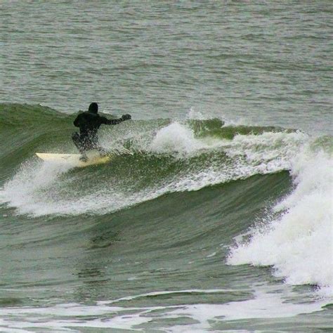 Winter surfing at Scot’s Bay near Liverpool - one of several excellent surfing destinations in ...