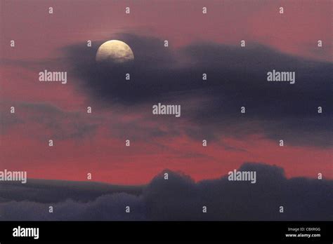 Moon in red sky Stock Photo - Alamy