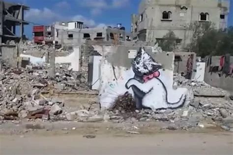 Banksy goes undercover in war-torn Gaza to create astonishing new art ...