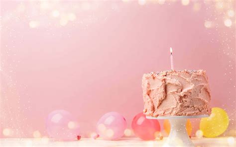 Download Scrumptious Birthday Cake with Colorful Candles and Confetti | Wallpapers.com