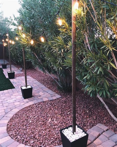 How To Hang Backyard String Lights Without Trees (Or Proper DIY String Light Poles) - Hello ...