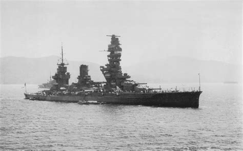 Japanese battleship Fuso, with the aircraft carrier Ryujo in the right distance, in Sukumo Bay ...