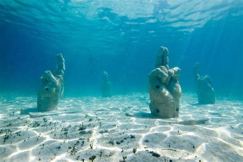 Beautiful and eerie images of the unique Cancun Underwater Museum